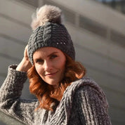 Frida women's plait knit bobble hat with strass sparkle and faux fur pom pom, by Sabbot