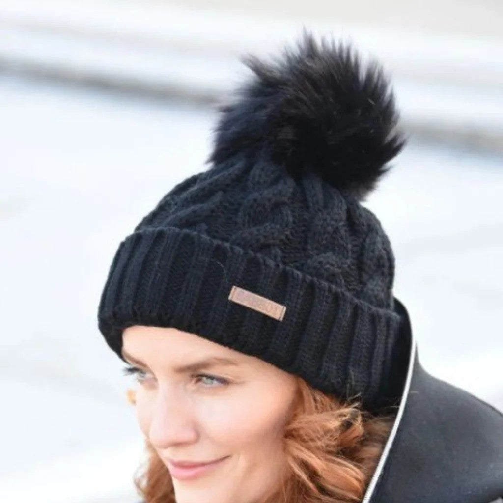 Linda women's cable knit bobble hat with faux fur pom pom, by Sabbot
