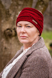 Two women in tweed jackets and riding boots wearing the Linda Headband in Burgundy