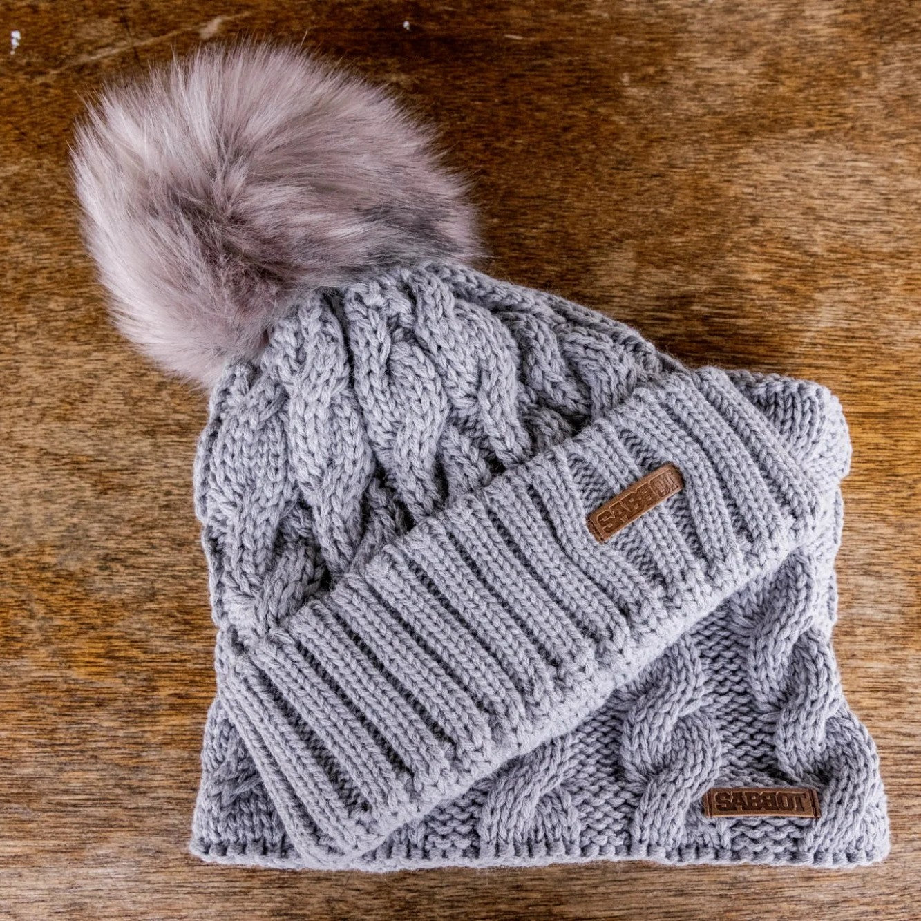 SABBOT Linda cable knit bobble hat and matching snood gift set in Light Grey