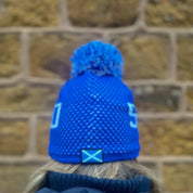 Back view of the SABBOT Scotland Bobble Hat showing the pom pom and saltire flag tab